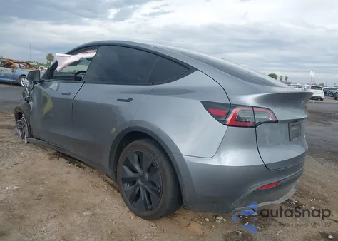 2025 Tesla Model Y Long Range Dual Motor All-Wheel Drive z USA, uszkodzony, nr VIN 7SAYGDEE0SF297224